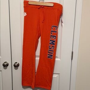 Champion Women’s Orange Sweatpants with Blue Lettering